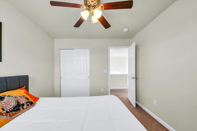 carpeted bedroom with a closet, a ceiling fan, and baseboards