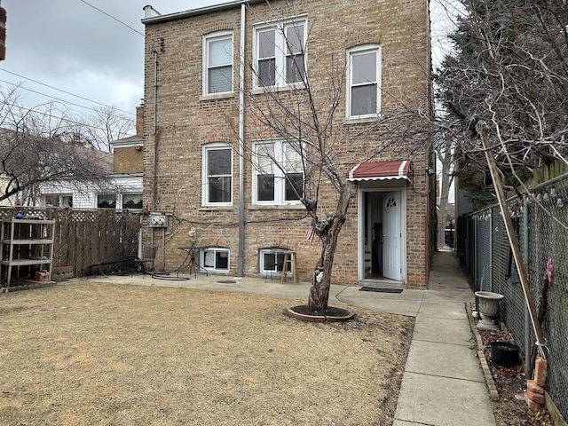 exterior space with a yard and a patio area