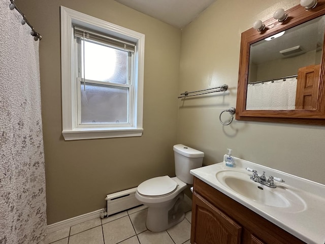 bathroom with vanity, a baseboard heating unit, tile patterned floors, and toilet