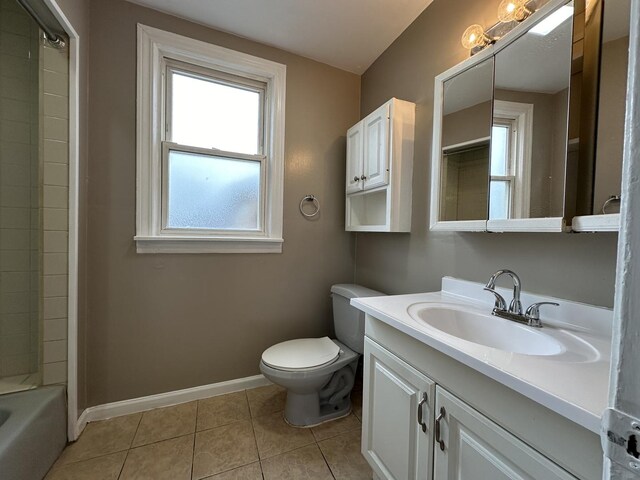 full bathroom featuring tile patterned floors, toilet, tub / shower combination, and vanity