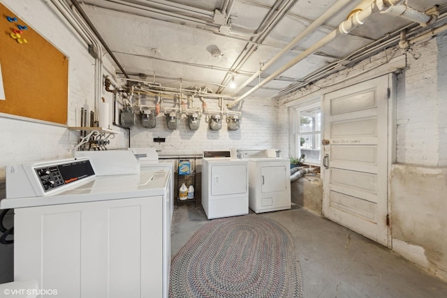 laundry room featuring washer and clothes dryer