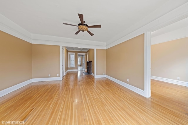 unfurnished living room with ceiling fan and light hardwood / wood-style floors