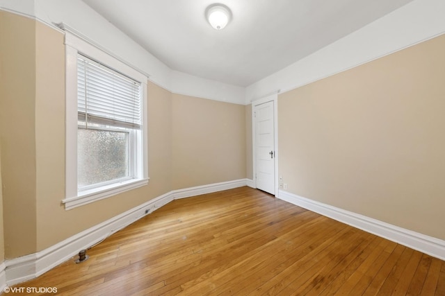 empty room featuring hardwood / wood-style floors