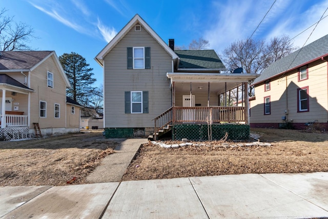 view of property featuring a porch