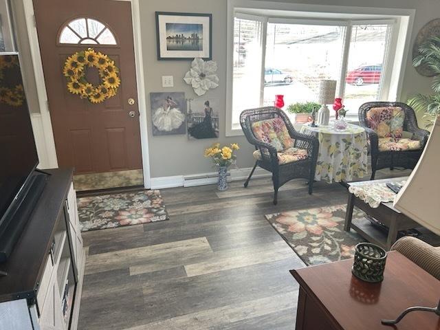 entrance foyer with dark hardwood / wood-style floors