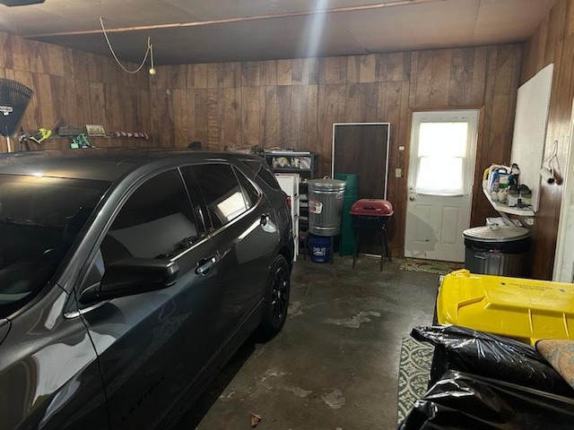 garage with wood walls