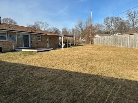 view of yard featuring a wooden deck