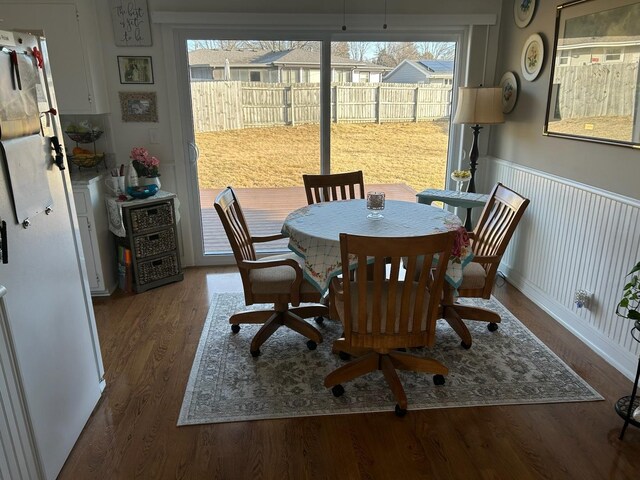 living room featuring hardwood / wood-style flooring and ornamental molding