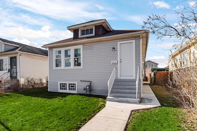 view of front of home featuring a front yard