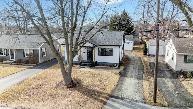 view of front of house with a shed