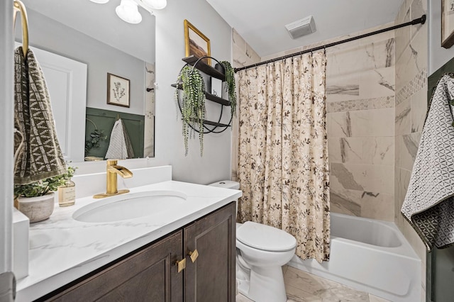 full bathroom with vanity, shower / bath combination with curtain, and toilet