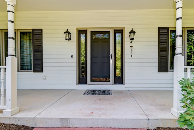 entrance to property with a porch