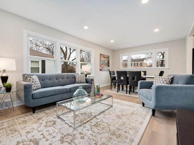 living room with light hardwood / wood-style floors