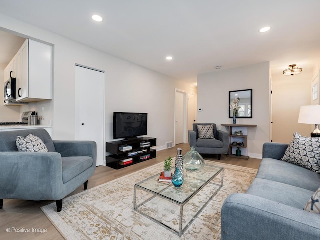 living room featuring light hardwood / wood-style floors