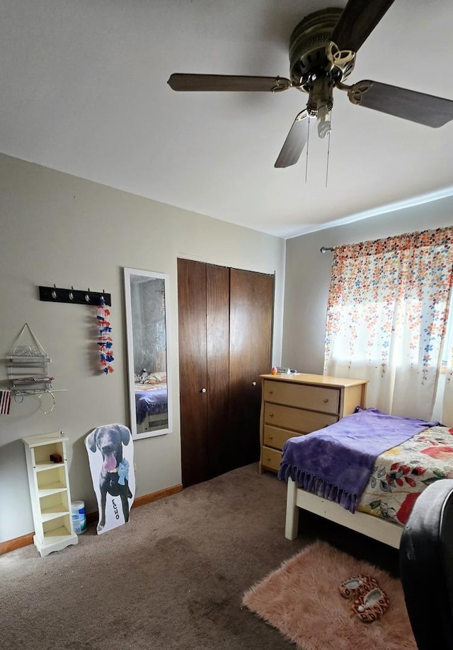 bedroom with carpet floors, a closet, and ceiling fan