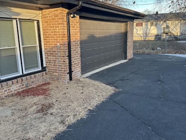 view of home's exterior featuring a garage