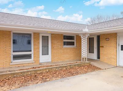 property entrance featuring a garage