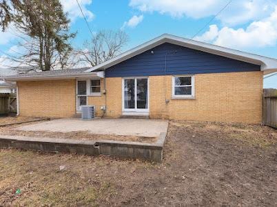 back of property featuring a patio area