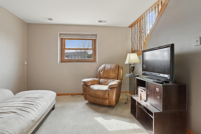 sitting room with light carpet