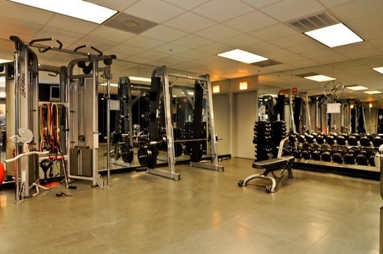 gym featuring a paneled ceiling