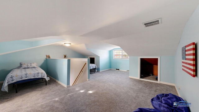 bonus room with visible vents, baseboards, carpet flooring, and vaulted ceiling