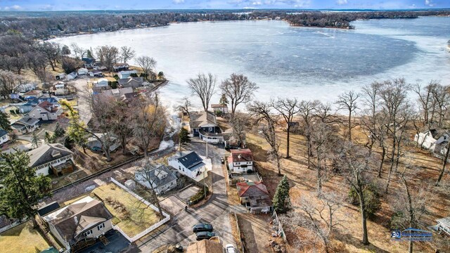 bird's eye view with a residential view and a water view