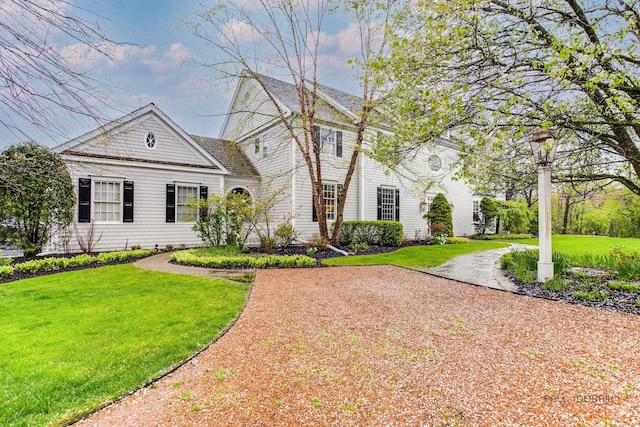 view of front of property with a front lawn