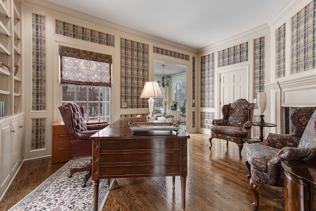 home office featuring ornamental molding and dark hardwood / wood-style flooring