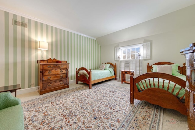 carpeted bedroom with vaulted ceiling