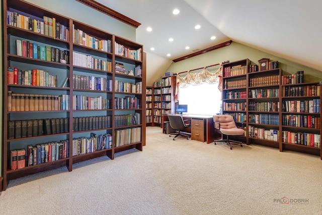 sitting room featuring crown molding, light colored carpet, and lofted ceiling