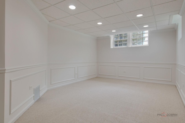 spare room with light colored carpet