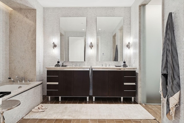 bathroom featuring vanity and a bathtub