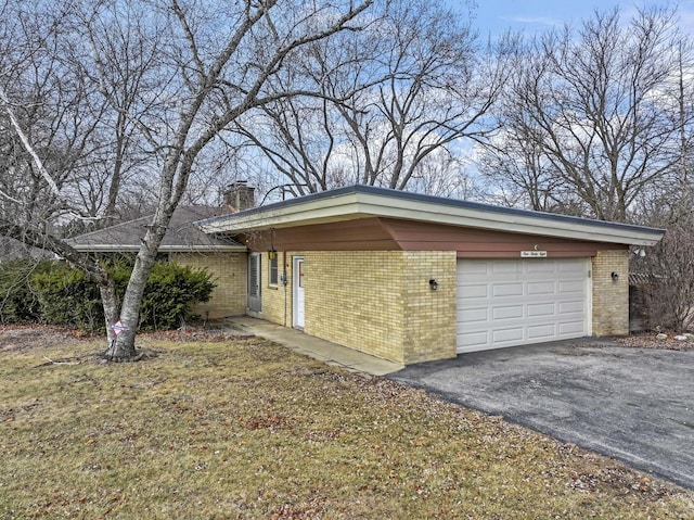 view of side of home featuring a garage