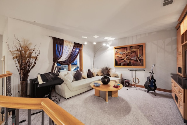 living room featuring light carpet