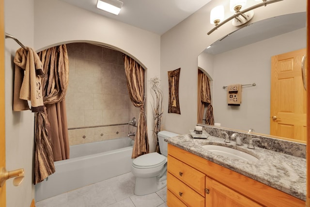 full bathroom featuring shower / bath combination with curtain, tile patterned floors, vanity, and toilet