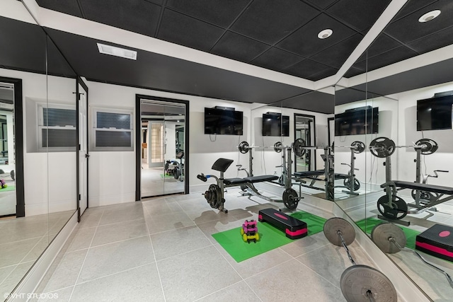 gym featuring light tile patterned floors