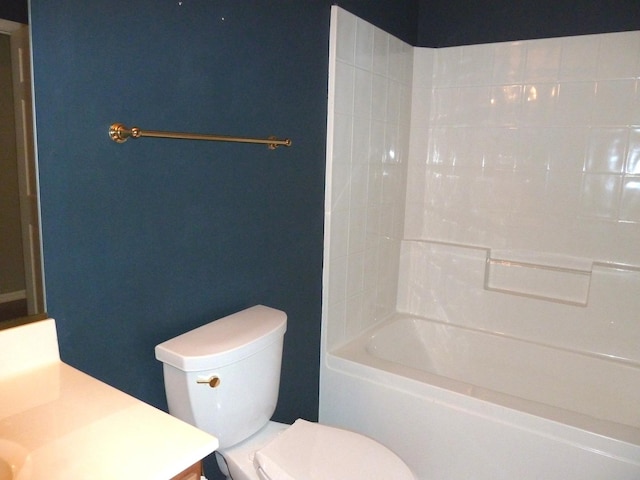 full bathroom with washtub / shower combination, vanity, and toilet