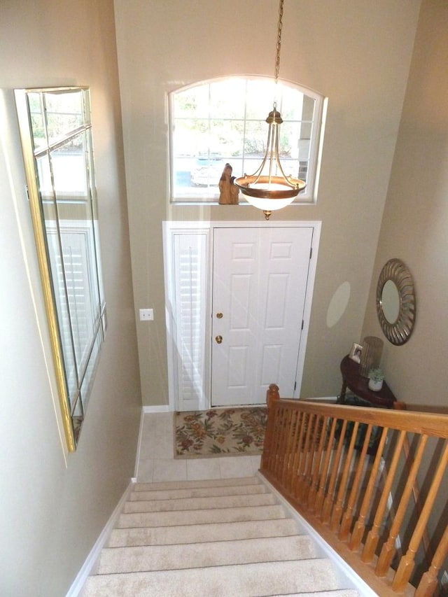 foyer entrance featuring tile patterned floors