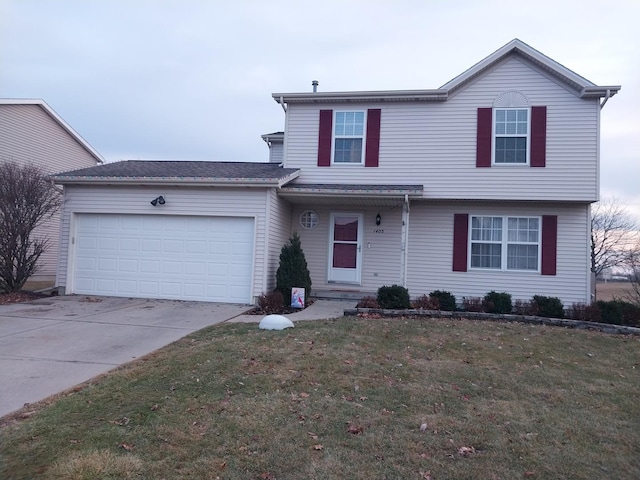 front facade featuring a garage and a front yard