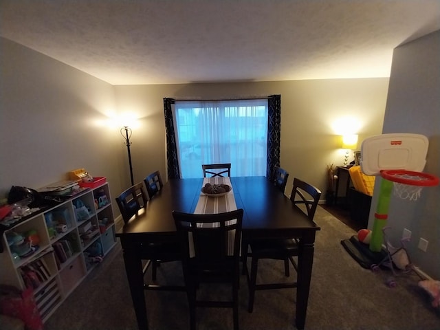 dining area featuring carpet flooring