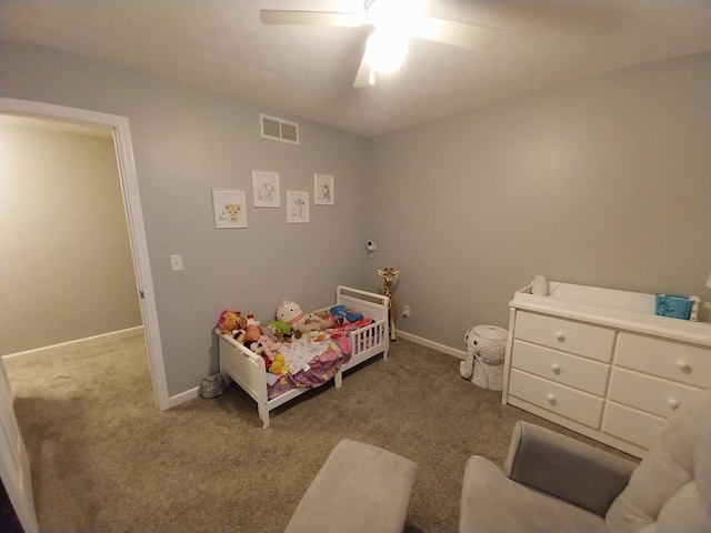 bedroom featuring light carpet and ceiling fan