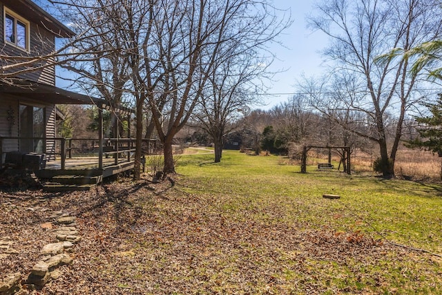 view of yard with a deck