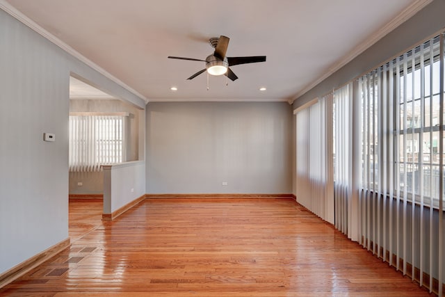 unfurnished room with crown molding, ceiling fan, and light wood-type flooring