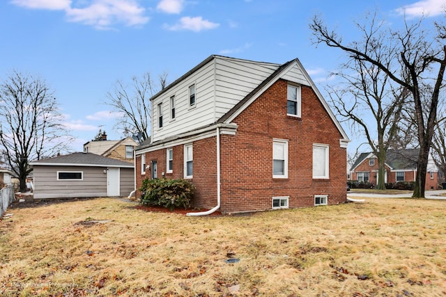 view of property exterior featuring a lawn