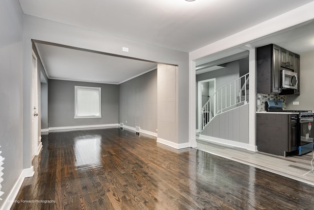 unfurnished room featuring dark wood-type flooring