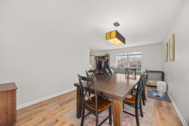 dining room featuring light wood-type flooring