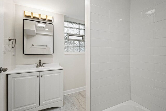 washroom featuring stacked washer / drying machine, hardwood / wood-style flooring, and wood walls