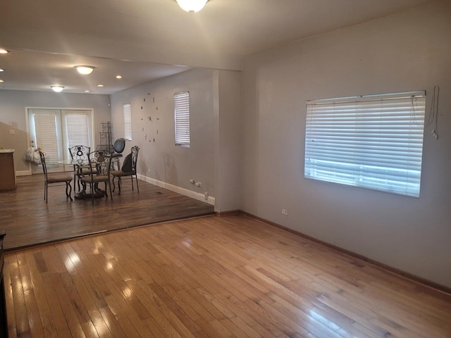 unfurnished dining area featuring hardwood / wood-style flooring