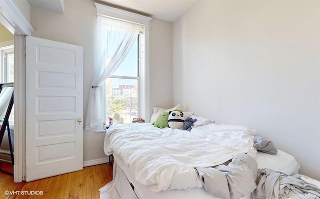 bedroom with light wood-style flooring