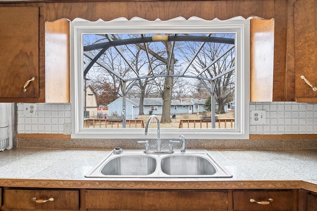 kitchen with sink and backsplash